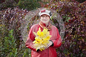 Mature woman with maple posy