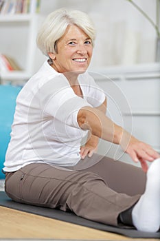 Mature woman practicing yoga