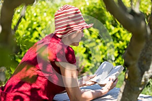 Mature woman reading book