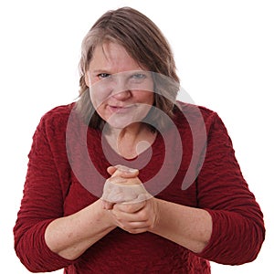 Mature woman rubbing hands