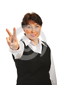 Mature woman show victory sign hand