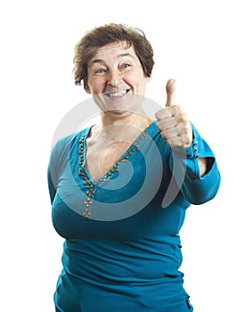 Mature woman shows a sign OK