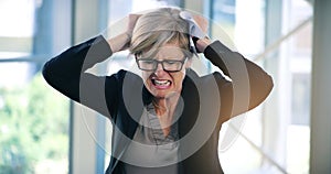 Mature woman, stress and rage in office, mental health and burnout for fail or work crisis. Female person, frustration