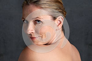 Mature woman, studio and nude for beauty, skincare and portrait look in happy body care. Anti wrinkle female person