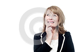 Mature woman thinking isolated on white