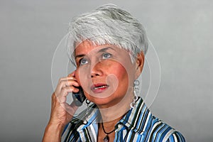 Mature woman using a cell phone