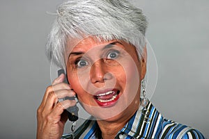 Mature woman using a cell phone