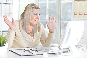 Mature woman using computer