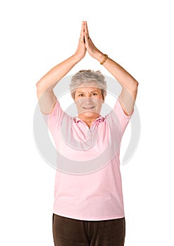 Mature woman in yoga position