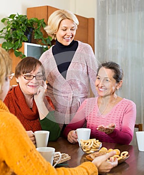 Mature women drinking tea