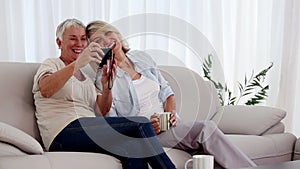 Mature women taking a picture together