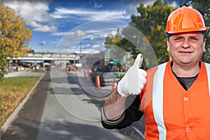 Mature worker and road repair