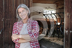 Matured farm woman with crossed arms