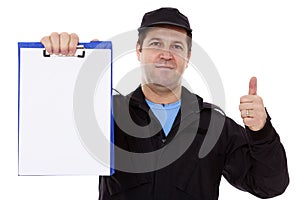 Matured male indicating down at whiteboard isolated over white