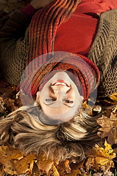 Matured woman in fall surrondings photo