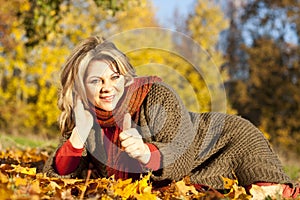 Matured woman in fall surrondings photo