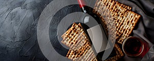 Matzah and red kosher wine on stone background. Passover celebration concept. Jewish Pesach holiday