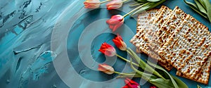 Matzah and spring flowers on kitchen table. Jewish holiday bread matza or matzoh. Happy Passover