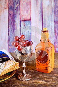 Matzah, an unleavened Jewish bread, a kosher wine cup for Passover decorated