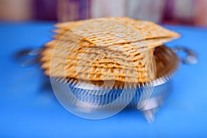 Matzo for Passover with metal tray on table