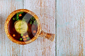 Matzoh ball soup. Jewish matzo ball soup with vegetables