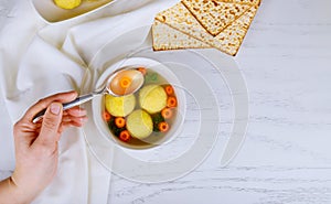 Matzoh ball soup with Pesach Passover symbols