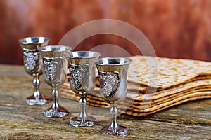 Matzot four glasses of red wine symbols of Passover