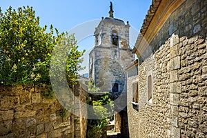 Maubec street arch alley medieval ancient village in Provence, France