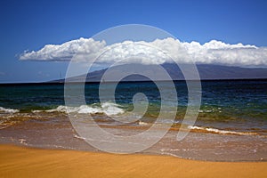 Maui Hawaii with clouds and beach front