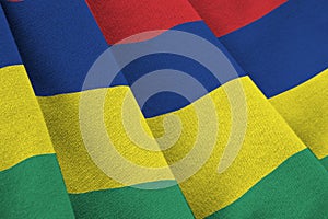 Mauritius flag with big folds waving close up under the studio light indoors. The official symbols and colors in banner