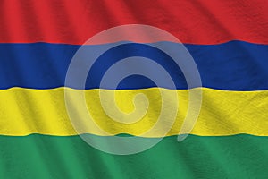 Mauritius flag with big folds waving close up under the studio light indoors. The official symbols and colors in banner