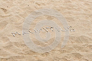 Mauritius inscription in the sand