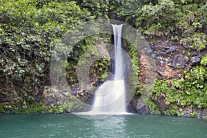 Mauritius. Small falls in `Valley of 23 colors of the Earth` park in Mare-aux-Aiguilles