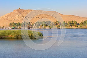 The Mausoleum of Aga Khan with feluccas on the Nile photo