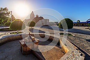 Mausoleum of Chashma-Ayub in Bukhara at sunset photo