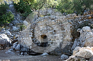 Mausoleum of the Roman city of Ocuri in Ubrique, Cadiz province, Andalusia, Spain photo