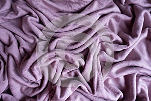Mauve viscose fabric with folds