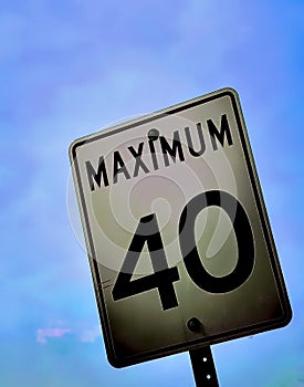 Max 40 Speed Limit Sign against Blue Sky