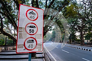 Maximum Speed Limit sign board for different kinds of vehicle on National Highway Rajpur road. Dehradun city of Uttarakhand, India