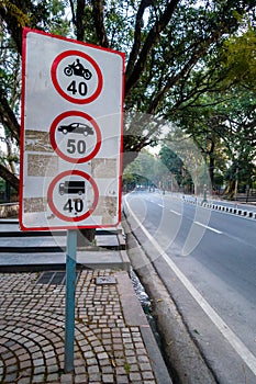 Maximum Speed Limit sign board for different kinds of vehicle on National Highway Rajpur road. Dehradun city of Uttarakhand, India