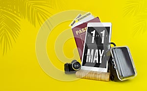 May 11st . Day 11 of month, Calendar date. Mechanical calendar display on your smartphone. The concept of travel. Spring month,