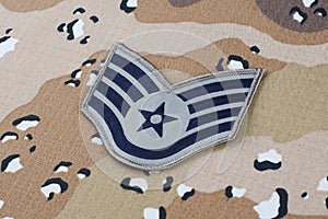 May 12, 2018. US AIR FORCE Staff Sergeant rank patch on Desert Battle Dress Uniform background