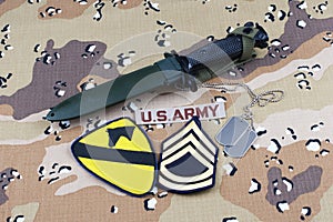 May 12, 2018. US ARMY 1st Cavalry Division patch bayonet and dog tags on desert camouflage uniform
