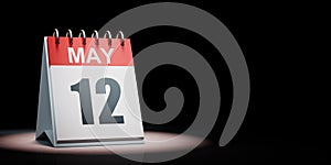 May 12 Calendar Spotlighted on Black Background