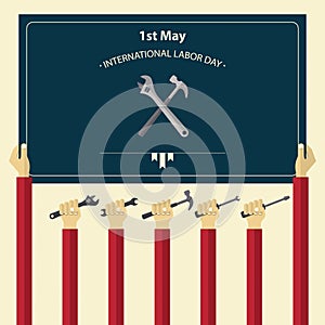 May 1st International Labor Day poster. Worker hand holding tools.