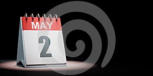 May 2 Calendar Spotlighted on Black Background