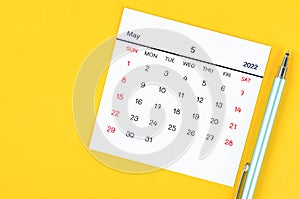 May 2022 calendar on yellow background