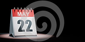 May 22 Calendar Spotlighted on Black Background