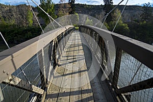 MAY 23, 2019, GREAT FALLS, MT., USA - walking bridge to The Great Falls of the Missouri River in Great Falls, Montana and