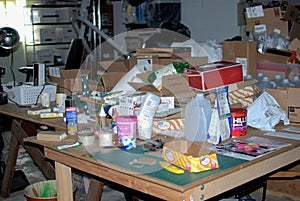 A messy table in a basement